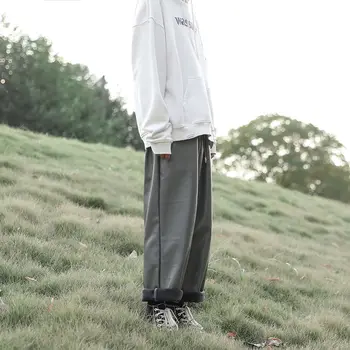 Korejas Ādas Bikses Vīriešu Modes Aukliņu Gadījuma Bikses Vīriešu Streetwear Savvaļas Zaudēt Hip-hop Taisni Plaša kāju Bikses Vīriešu S-2XL